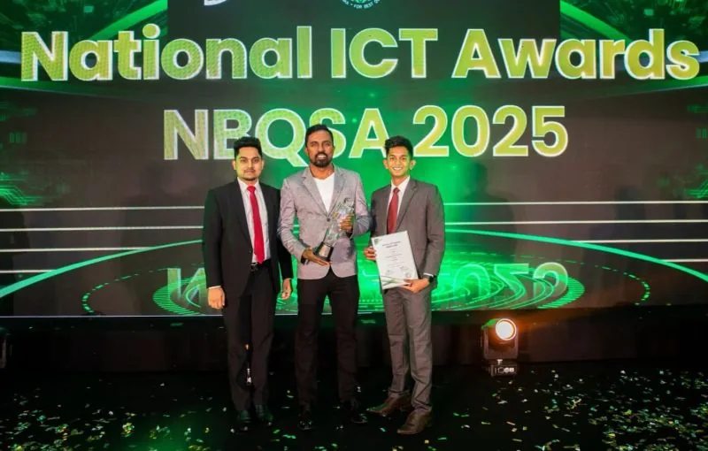 Attendees with a trophy and certificate at NBQSA 2025.