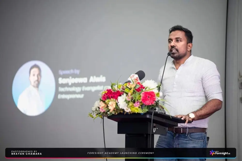 Sanjeewa speaking at a lectern during Mora Foresight 2023.